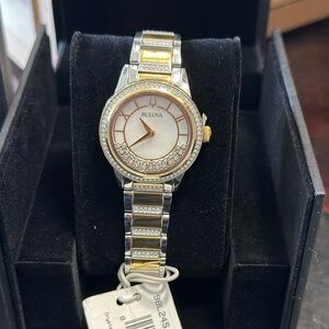 Bulova Crystal Turnstyle Mother of Pearl Dial Two-Tone Ladies Watch